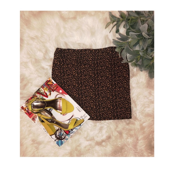 Xhilaration Dresses & Skirts - Xhiliration cheetah print mini skirt✨